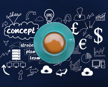 Blue cup of coffee against navy blue with doodlesの写真素材