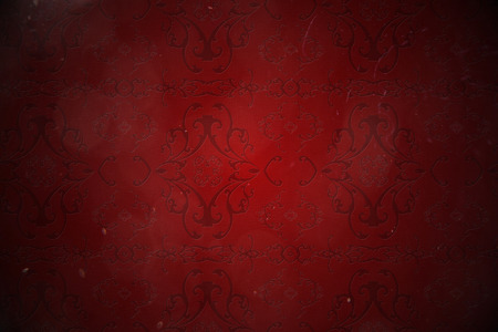 Digitally generated elegant patterned wallpaper in red tonesの写真素材