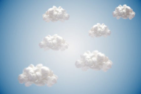 White cloud computing clouds on blue backgroundの写真素材