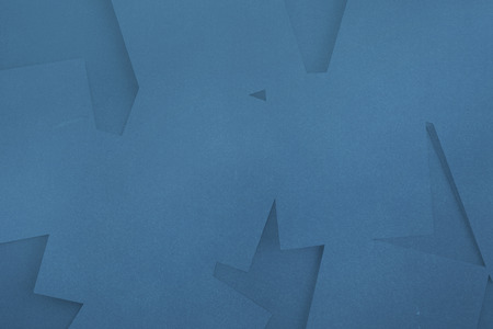 Digitally generated blue paper strewn over blue surfaceの写真素材