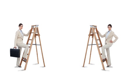 Multiple image of businesswoman climbing ladder on white backgroundの写真素材