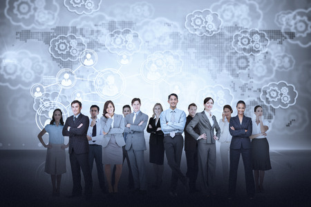 Digital composite of business team against cogs and wheels backgroundの写真素材