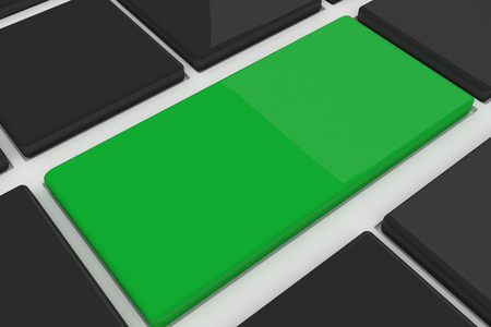 Black keyboard with one green keyの写真素材