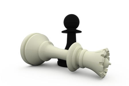 Black pawn with fallen white queen on white backgroundの写真素材