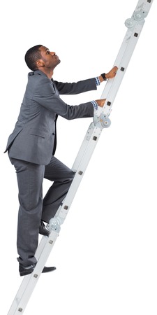 Businessman climbing up ladder on white backgroundの写真素材
