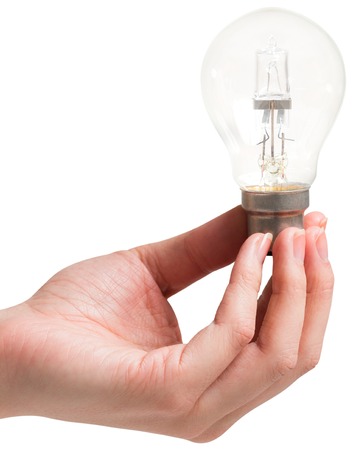 Hand holding light bulb on white backgroundの写真素材