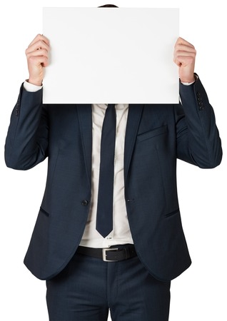 Businessman showing card to camera on white backgroundの写真素材