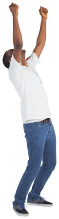 Excited handsome football fan cheering on white background