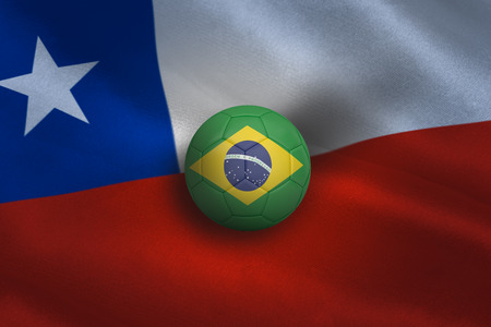 Football in brasil colours against chile flag backgroundの写真素材