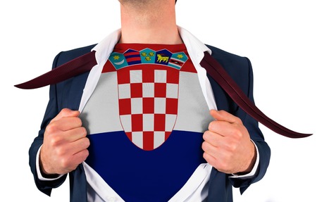 Businessman opening shirt to reveal croatia flag on white backgroundの写真素材