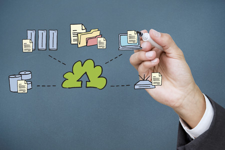 Businessman writing graphic against blue background with vignetteの写真素材