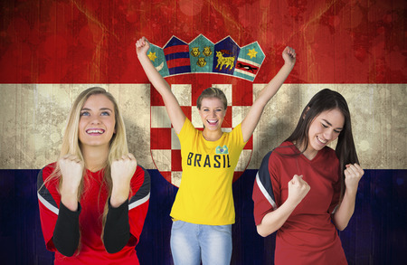 Composite image of various football fans against croatia flag in grunge effectの写真素材