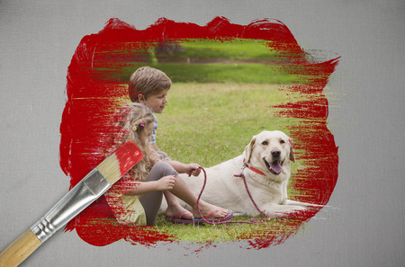Composite image of siblings and their dog with paintbrush dipped in red against digitally generated grey backgroundの写真素材