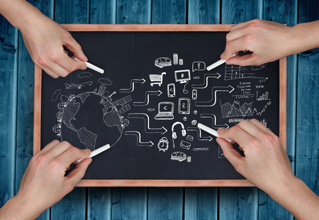 Composite image of multiple hands drawing brainstorm with chalk on wooden boardの写真素材