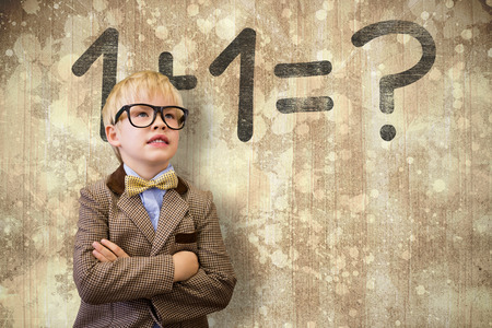 Cute pupil dressed up as teacher  against wooden surface with planks
