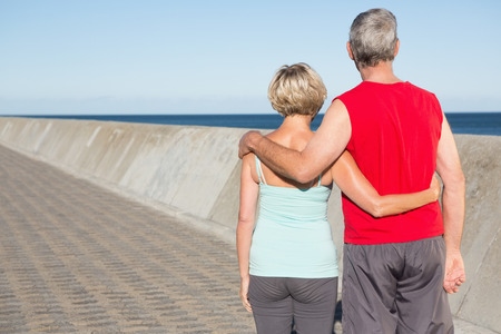 Active senior couple out for a jog on a sunny dayの写真素材