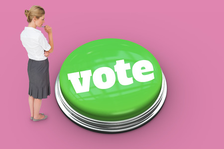 The word vote and thinking businesswoman against pink backgroundの写真素材