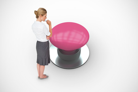 Thinking businesswoman against white background with graphic background
