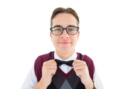 Smiling geeky hipster looking at camera on white backgroundの写真素材