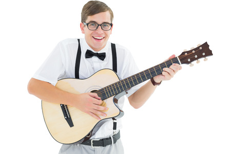 Geeky hipster playing guitar and singing on white backgroundの写真素材