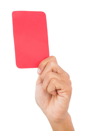 Hand holding up red card on white backgroundの写真素材