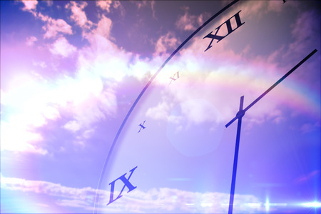Digitally generated roman numeral clock on blue sky background