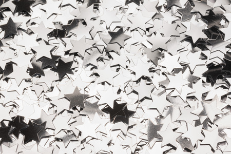 Many silver star decorations background full imageの写真素材