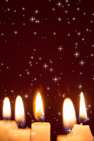 Night sky against five candles の写真素材