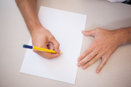 Designer drawing the old fashioned way in the officeの写真素材