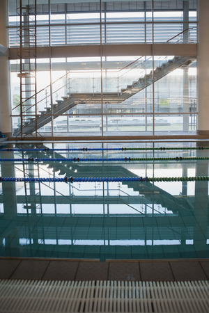 Empty swimming pool with lane markers at the leisure centerの写真素材