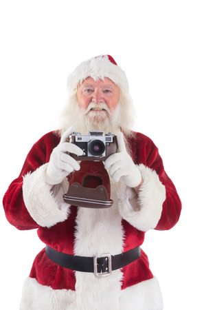 Santa is taking a picture on white backgroundの写真素材
