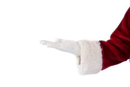 Santa Claus presents something with his open hand on white backgroundの写真素材