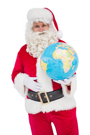 Happy santa claus holding a globe on white backgroundの写真素材
