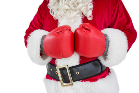 Mid section of santa with boxing gloves on white backgroundの写真素材
