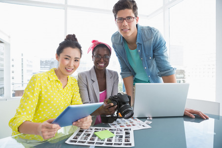 Young creative team having a meeting in creative officeの写真素材