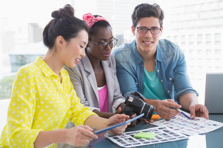 Young creative team having a meeting in creative officeの写真素材