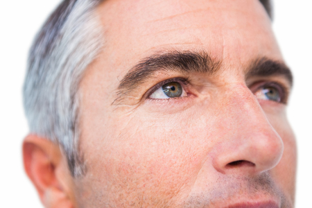 Close up of a man with grey hair on white backgroundの写真素材