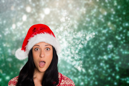 Woman surprised at the camera against blurred lightsの写真素材