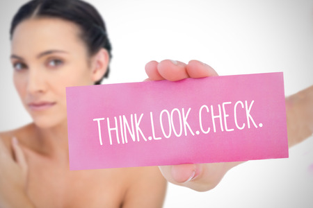 Composite image for breast cancer awareness with text on cardの写真素材