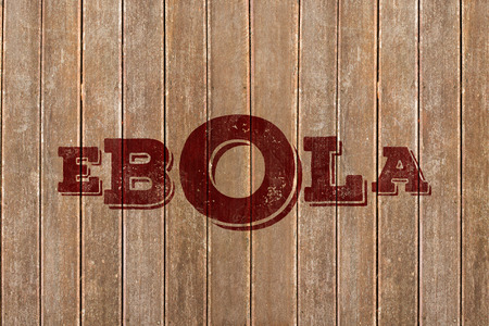 Red ebola text against wooden surface with planksの写真素材