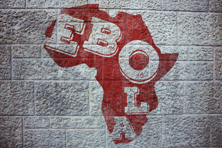 Red ebola text on africa outline against grey brick wallの写真素材
