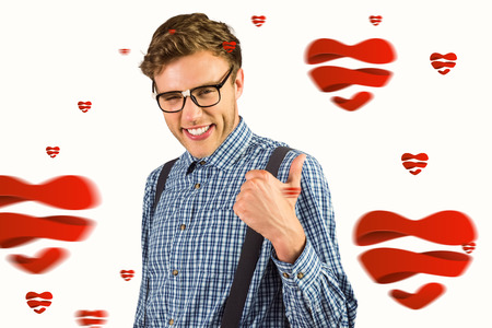 Geeky hipster showing thumbs up against heartsの写真素材