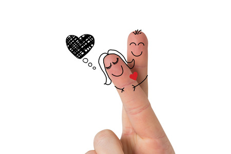 Fingers crossed like a couple against heartの写真素材