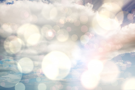 Light glowing dots design pattern against skyの写真素材