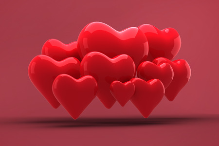 Love hearts against redの写真素材