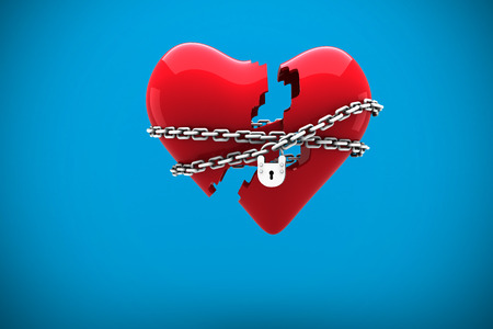 Locked heart against blue background with vignetteの写真素材