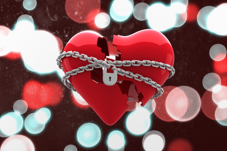 Locked heart against digitally generated twinkling light designの写真素材