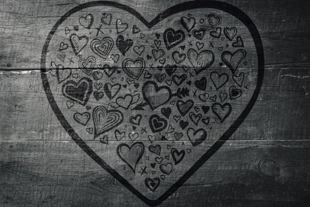Heart against overhead of wooden planksの写真素材