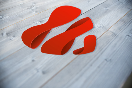 Heart against bleached wooden planks backgroundの写真素材