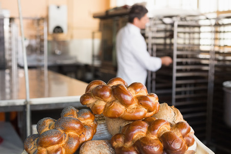 Board of different types of bread in the kitchen of the bakery